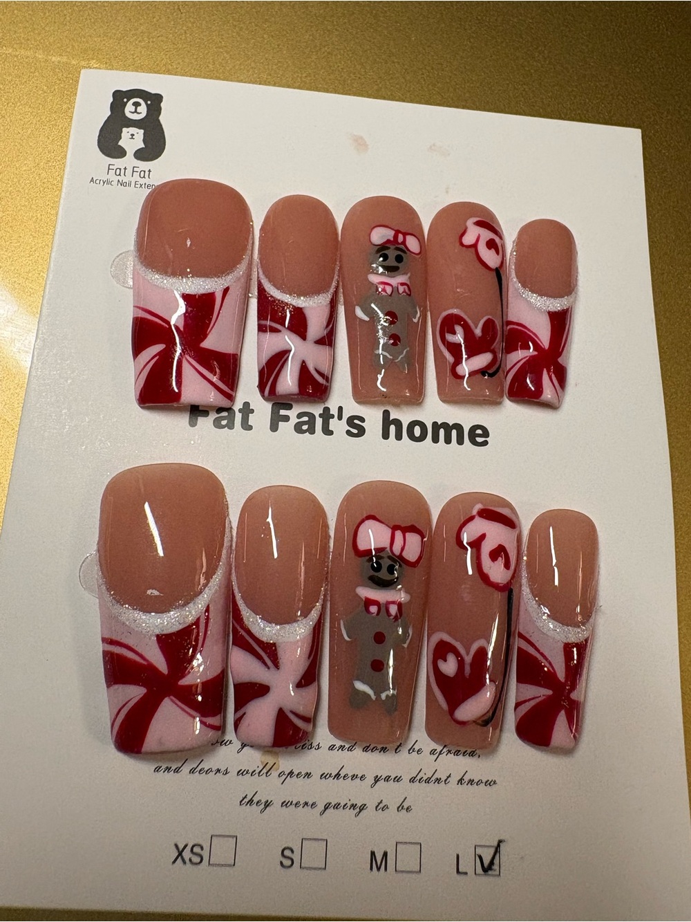 Nude Pink Press-On Nails with Red Candy Swirl & Gingerbread Accent